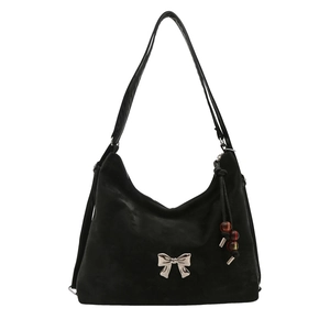 Classic black hobo shoulder bag with silver bow buckle and beaded tassel detail