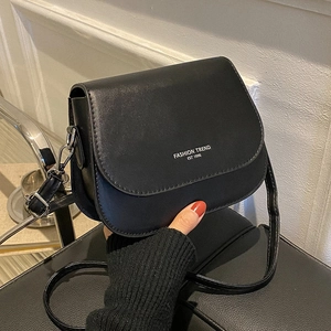 Classic black saddle crossbody bag with white fashion trend logo and adjustable strap