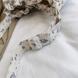 Floral canvas tote bag with adjustable shoulder strap and delicate micro stitching detail