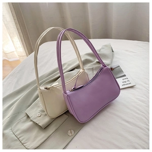 Lavender and cream baguette shoulder bags in smooth leather with long straps