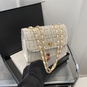 Fashionable white tweed chain shoulder bag with gold metal lock and gift box display