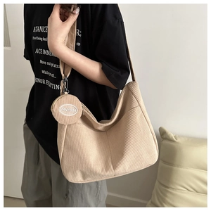 Beige corduroy hobo shoulder bag with large capacity and small round decorative pouch