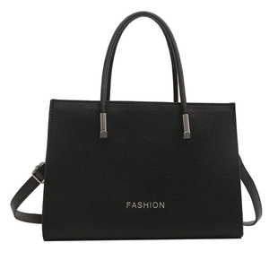 Minimalist black lychee pattern leather tote bag with silver FASHION text and top handle