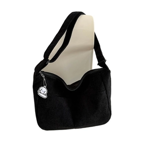 Minimalist black corduroy crossbody bag with adjustable strap and cute dog charm
