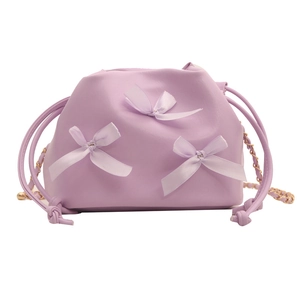 Lavender ruched bucket bag with satin bows and golden chain strap for women