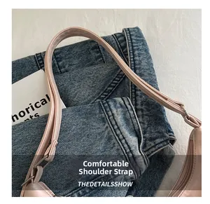 Close-up of the slim adjustable pink shoulder strap with polished silver metal buckle