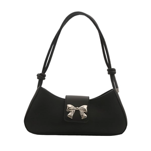 Minimalist black square underarm bag with silver metal bow buckle and knotted strap detail