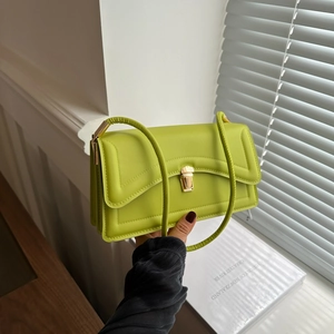 Chic avocado green rectangular shoulder bag with golden buckle and sleek leather texture