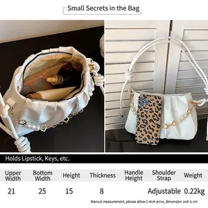 White pleated cloud handbag with chain strap and size chart detail overview