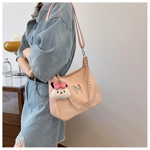 Pink canvas shoulder tote bag with metal butterfly and cute plush charm detail