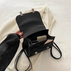 Minimalist black PU leather flap backpack for women with adjustable shoulder straps