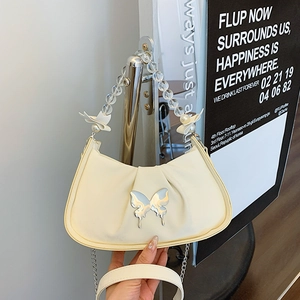 Chic cream white crescent underarm bag with silver butterfly buckle and pearl bead handle
