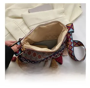 Interior view of bohemian tote bag showing large capacity for phone and wallet with zipper