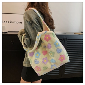 Plush shoulder tote bag in off-white with colorful floral patterns and heart details