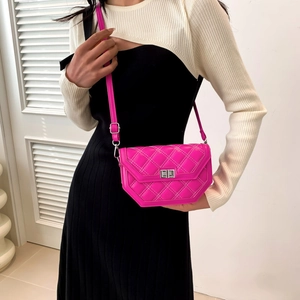 Pink quilted crossbody bag for women with silver lock and adjustable shoulder strap