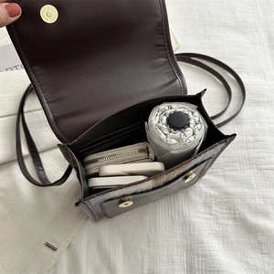 Retro contrast color mini backpack showing inner capacity for umbrella and long wallet