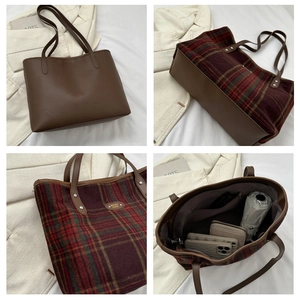 Detail view of large checkered tote bag showing interior pocket and spacious capacity