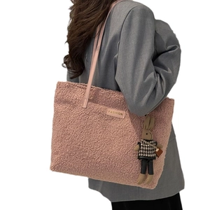 Pink plush tote bag with leather strap and bunny charm for women's casual daily use