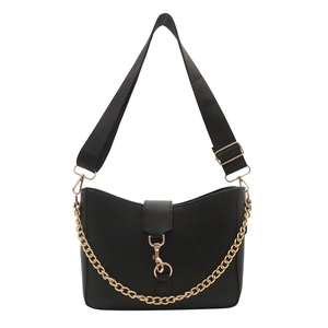 Minimalist black leather saddle bag with gold chain and wide textile shoulder strap