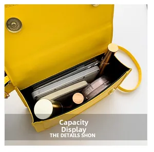 Interior view of the yellow leather crossbody bag showing spacious storage capacity