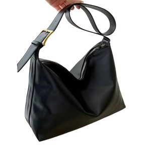 Minimalist large black leather hobo shoulder bag with wide strap and gold buckle detail