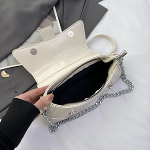 Retro cream white saddle bag with silver chain strap and magnetic snap closure