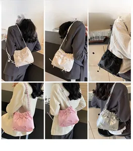 Collage of model wearing colorful drawstring bucket bags with cute bow decorations