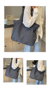 Détail du grand sac cabas en tissu Oxford avec cordon latéral et large bandoulière