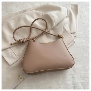 Minimalist khaki PU leather underarm bag with knot detail and golden hardware