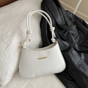 Sac à bandoulière blanc minimaliste en similicuir avec barre dorée et sangle à nœuds