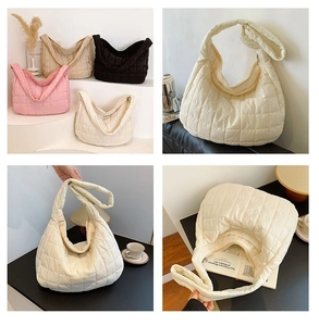 Detailed quilted texture of oversized hobo bags in pink black beige and cream colors