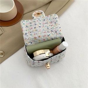 Mini tweed flap crossbody bag with gold turn-lock and chain strap for summer style