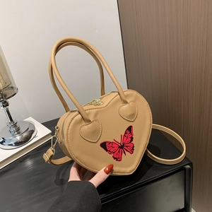 Chic heart-shaped beige handbag with red butterfly print and top handle for women