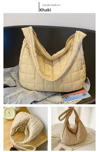 Detail of khaki quilted puffer tote bag with soft diamond stitching and zip closure