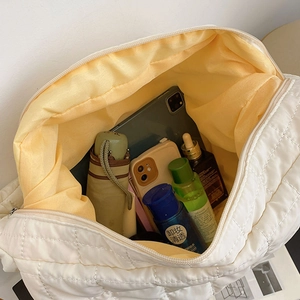White quilted puffer tote bag with large capacity for daily essentials and cosmetics