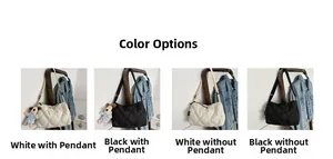Quilted round shoulder bag available in black and white with cute plush dog pendant charm