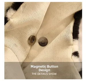 Detailed view of the magnetic snap closure on the fluffy spotted faux fur shoulder bag