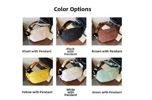 Multiple colors of corduroy crossbody bags with soot sprite charms in various options