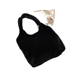 Chic black plush faux fur tote bag with a minimalist large capacity top handle design