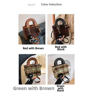 Detail of wool plaid crossbody bags in four colors with furry plush charms