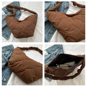 Brown quilted crossbody bucket bag with rhombus pattern and spacious interior