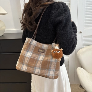 Vintage brown plaid wool tote bag for women with plush doll charm and leather logo