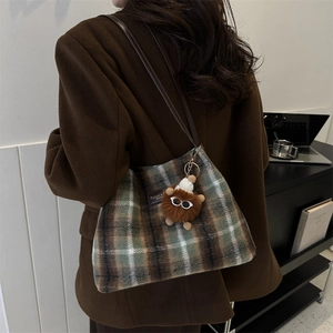 Vintage plaid wool tote bag for women with leather straps and plush charm on shoulder
