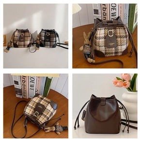 Detail of retro plaid bucket bag featuring leather stitching and cute rabbit charm