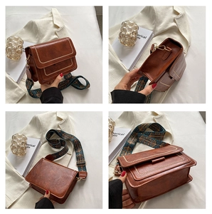 Detailed views of a vintage brown crossbody bag with an ethnic style jacquard wide strap