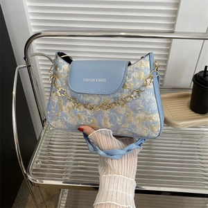 Sky blue jacquard underarm bag with gold embroidery and floral chain link handle