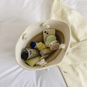 Elegant woven tote bag with dual-tone design and large capacity for daily essentials