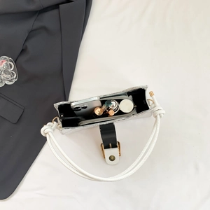 Chic silver quilted leather shoulder bag with woven rope handle and interior storage