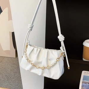 Elegant white pleated cloud bag with pearl chain and knot shoulder strap detail