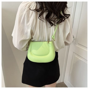 Sac à bandoulière vert néon en forme de pois avec nœuds décoratifs et détails dorés chics